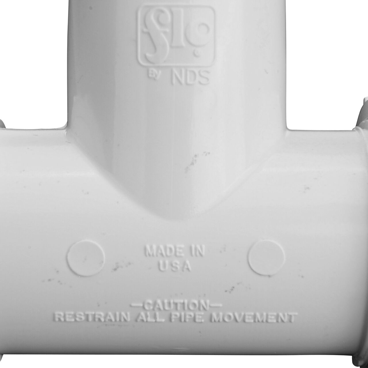 Closeup view of The NDS PVC Threaded Tees 1 in. IPS UC X FPT showing that it is made in the USA as part of a complete flow management system for pool, spa, irrigation, and plumbing applications (NDS CPT-1000-T)