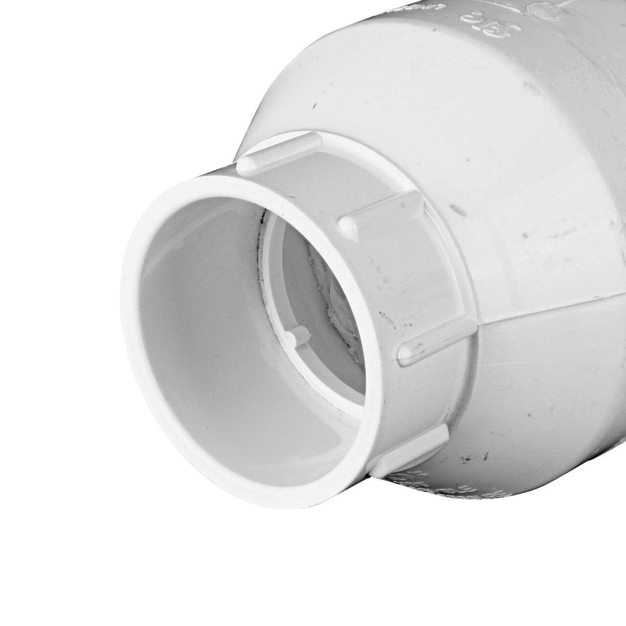 Closeup of the outlet end of the NDS White 2 in. female end by female end PVC Swing Check Valve (NDS 1520-20F) which prevents backflow in pipelines