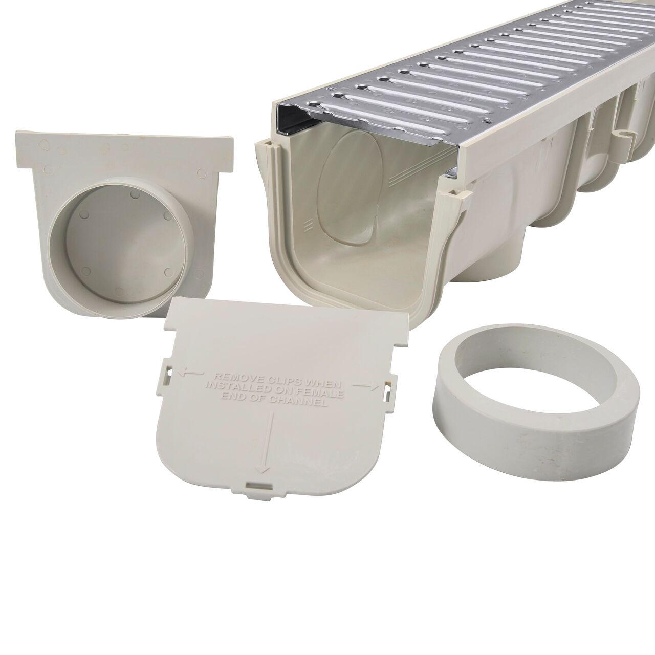 Closeup of the NDS 5 in. Pro Series Channel Drain Kit unassembled, with Channel Drain, 2 Galvanized Steel Drain Grates on drain, End Cap/Outlet, and End Cap (NDS 864GMTL)