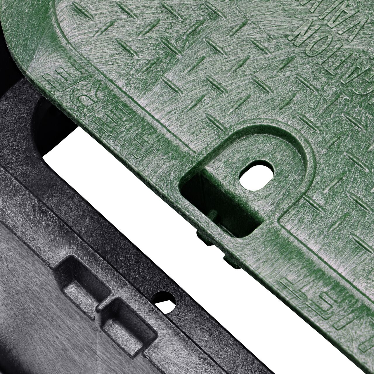 Align the bolt hole on the lid with the bolt hole from the NDS 14 X 19 in. Rectangular Standard Series Black Box Extension and Green Irrigation Control Valve Cover (NDS 115) for a secure fit