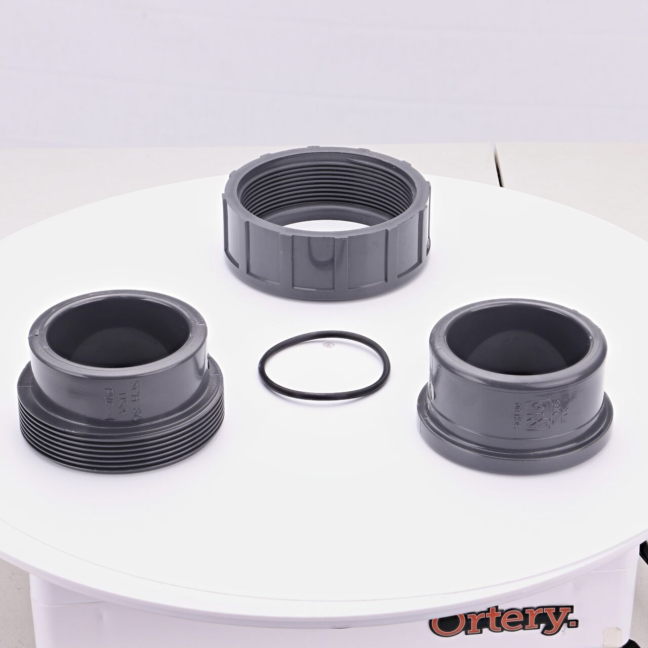 The NDS 2 in. PVC Union shown here unassembled, includes the EPDM O-ring that is placed in the center of the union to create a leak-resistant seal (NDS U-2000-S)