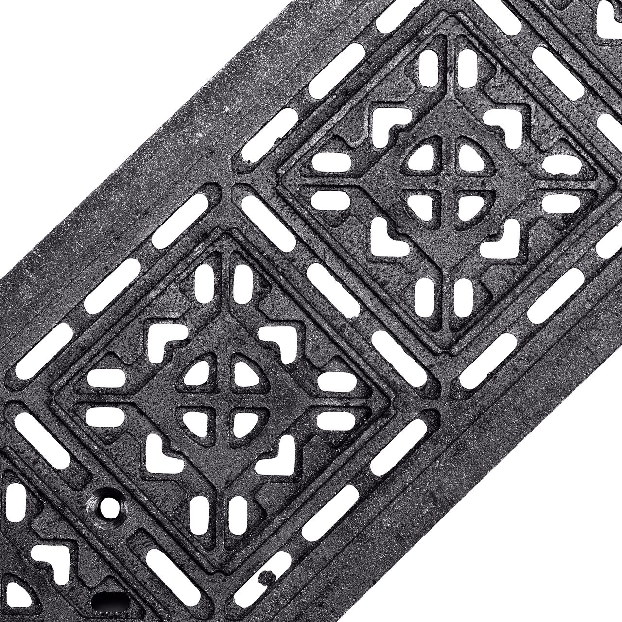 Angled View of the ductile iron Dura Slope™ Channel Drain Grate (NDS DS-603) decorative tile pattern design