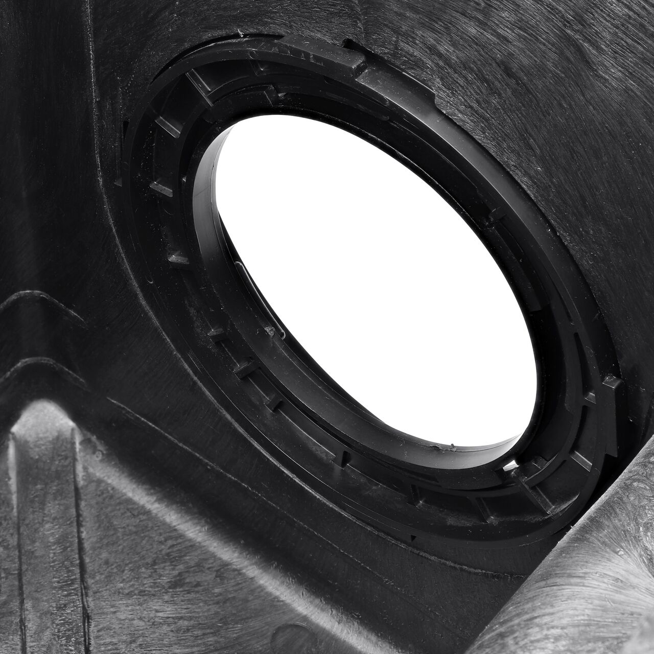Closeup of the lock and key when the NDS Outlet Adapter  (NDS 1889) is installed to the 12 in. catch basin