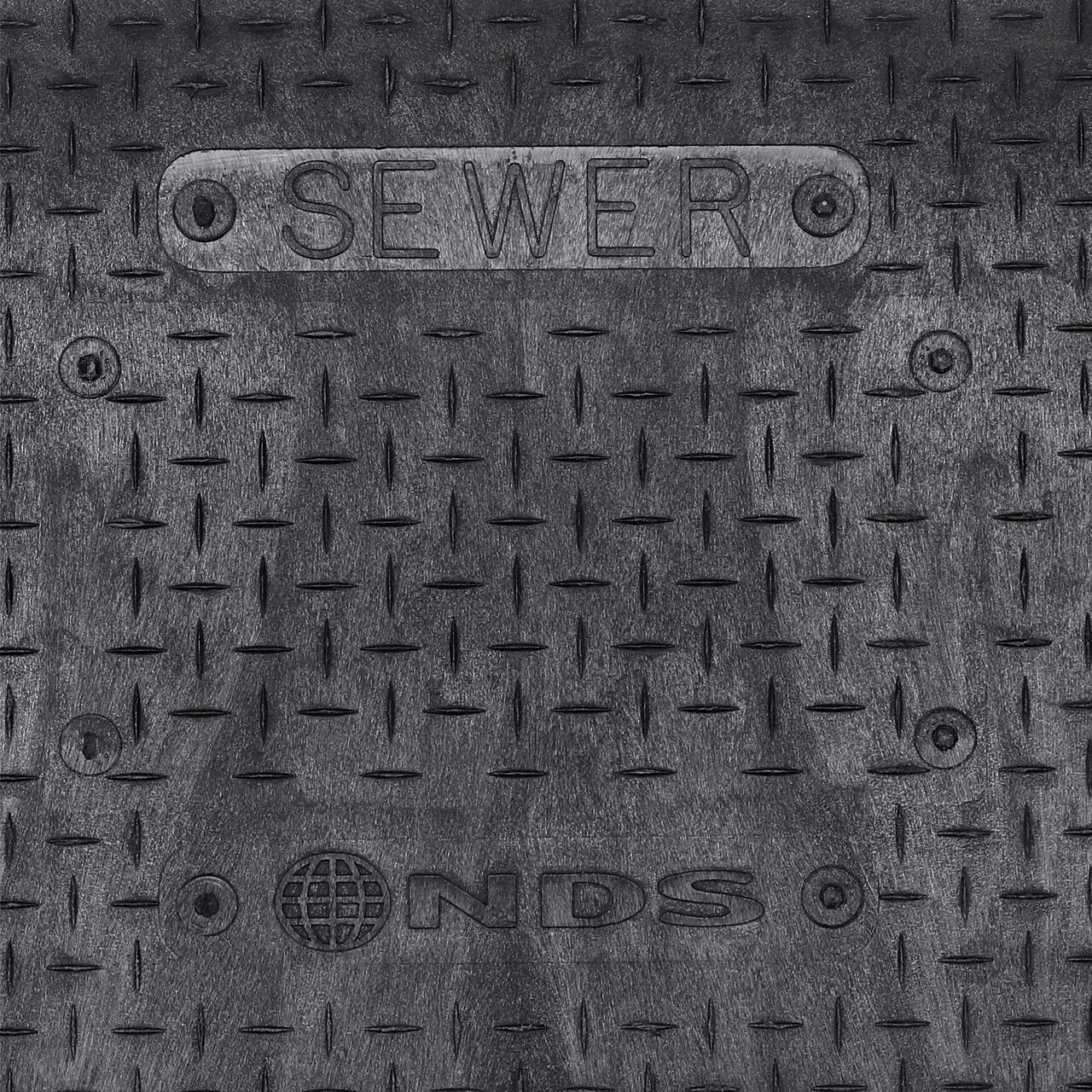 Closeup view of the Sewer markings on the Black Sewer Drop-in cover for the NDS 14 in. X 19 in. Rectangular Standard Series Meter Cover (NDS D1200-DISBSWRL)