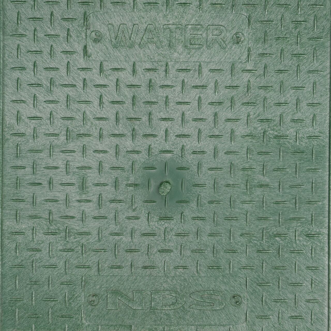 Closeup view of the NDS logo and Irrigation Control Valve markings on the Green Irrigation Control Valve cover for the NDS 14 X 19 in. Rectangular Standard Series Valve Box (NDS 114BCW)