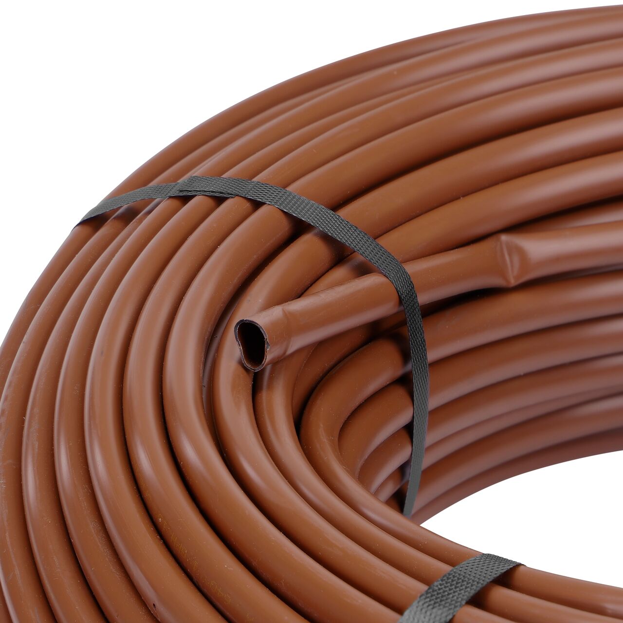 Closeup view of the inside end of the NDS 500 ft. Brown Tubing with 1.0 GPH Pressure Compensating Emitters with 12 in. Spacing (NDS SFPC-BL-6418-05)