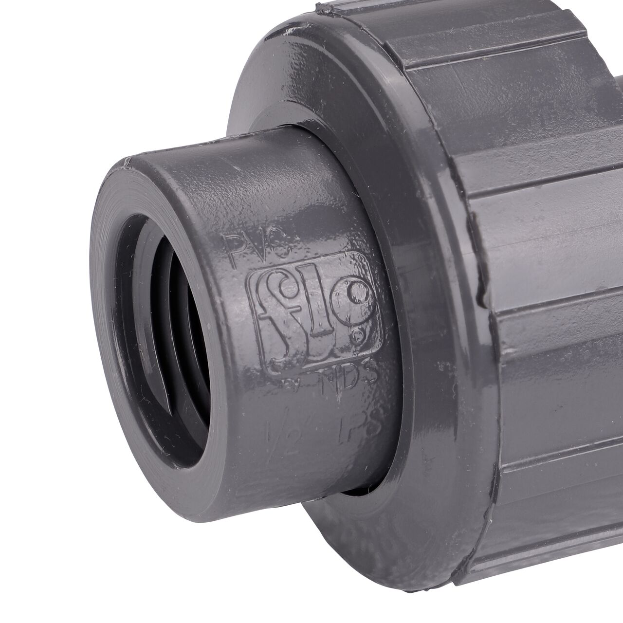 Close up view of the NDS 1/2 in. PVC FPT Union showing NDS brand a leader in flow management solutions and the preferred choice of professionals since 1972 mark (NDS U-0500-T)