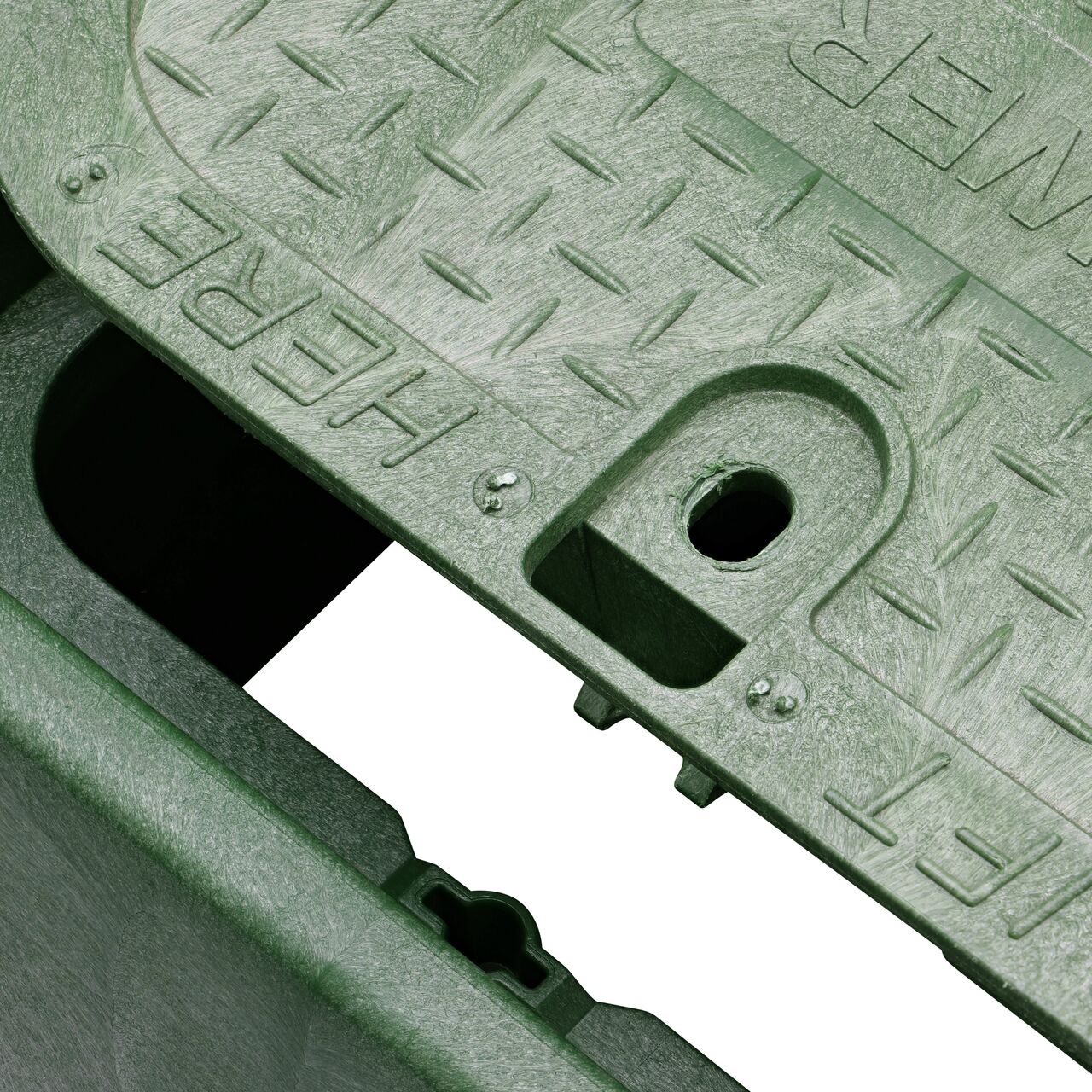 Align the bolt hole on the lid with the bolt hole from the NDS 14 in. X 19 in. Rectangular Standard Series Green Box and Green Sewer Cover (NDS 114BCS) for a secure fit
