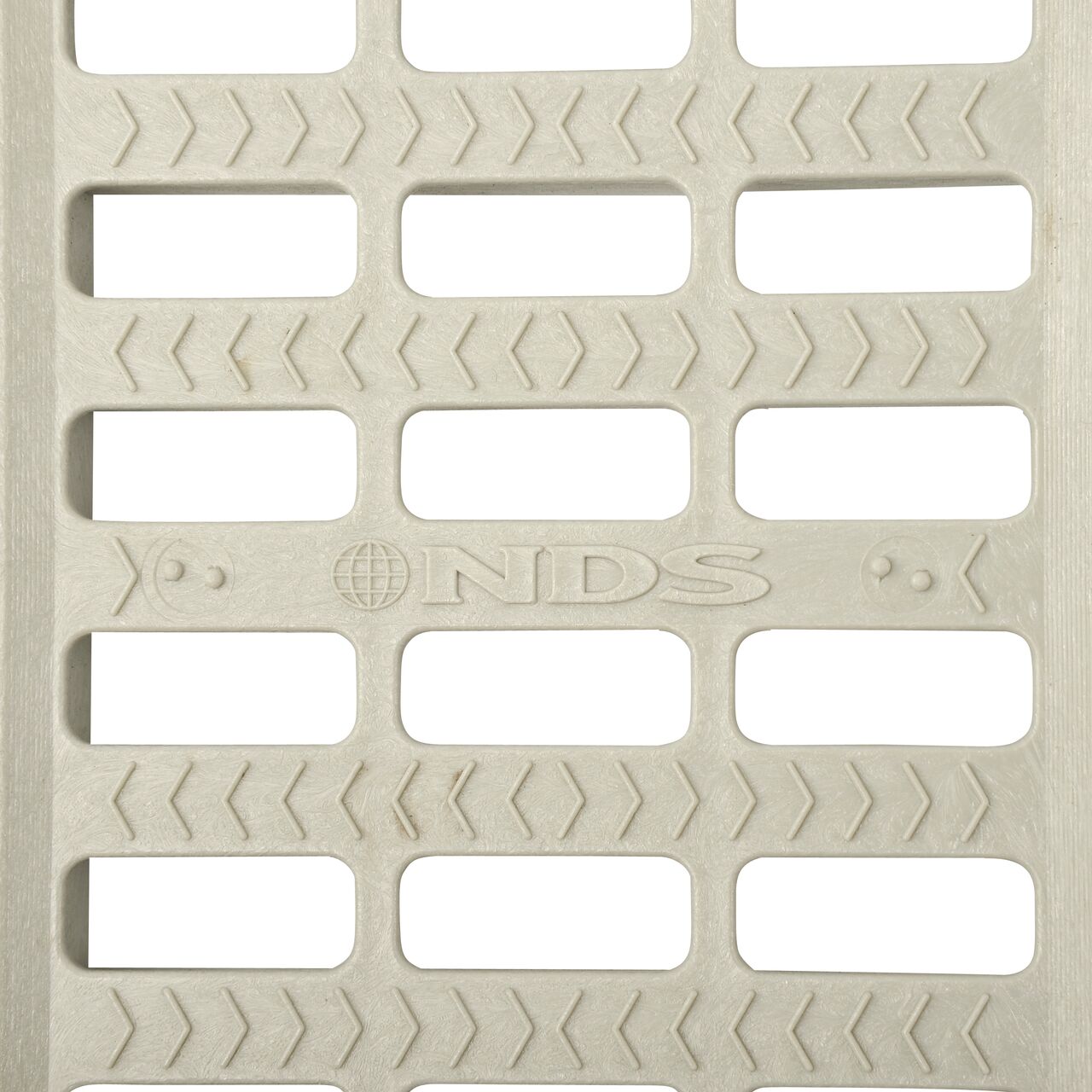 Top down partial closeup of grate openings on NDS 5 in. Pro Series Channel Drain Grate in Gray Plastic (NDS 814)