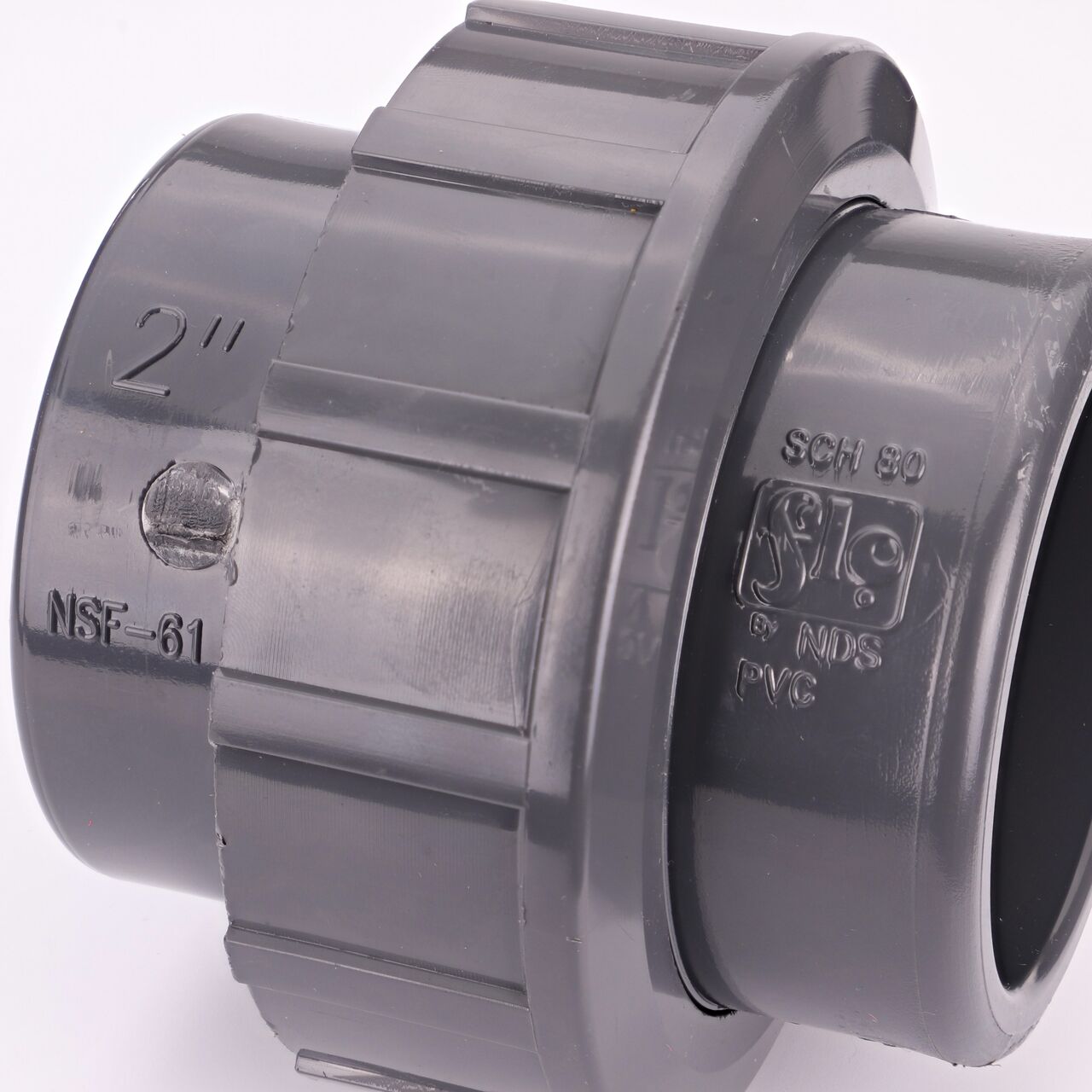 Close up view of the PVC Union, 2 in. Sch. 80 S X FPT showing NDS brand a leader in flow management solutions and the preferred choice of professionals since 1972 mark (NDS U-2000-ST)