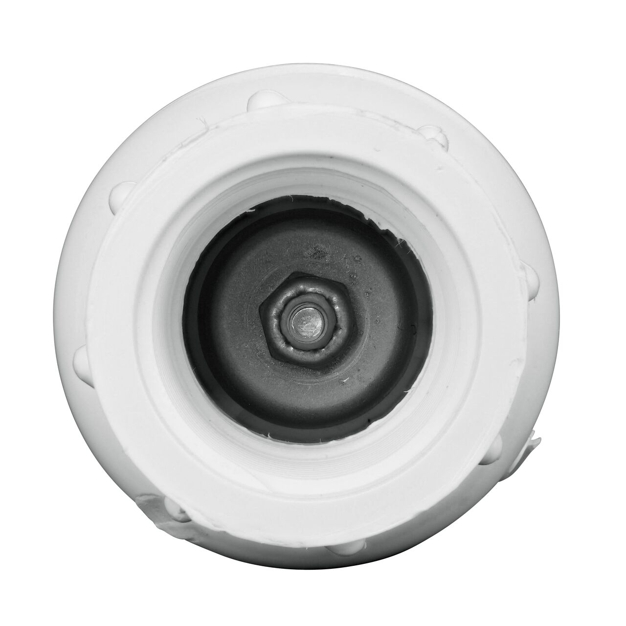 Closeup of the adjustable nut on the NDS White 3/4 in. IPS FPT X FPT PVC Adjustable Spring Check Valve (NDS 1205-07, NDS 1205-07-20)