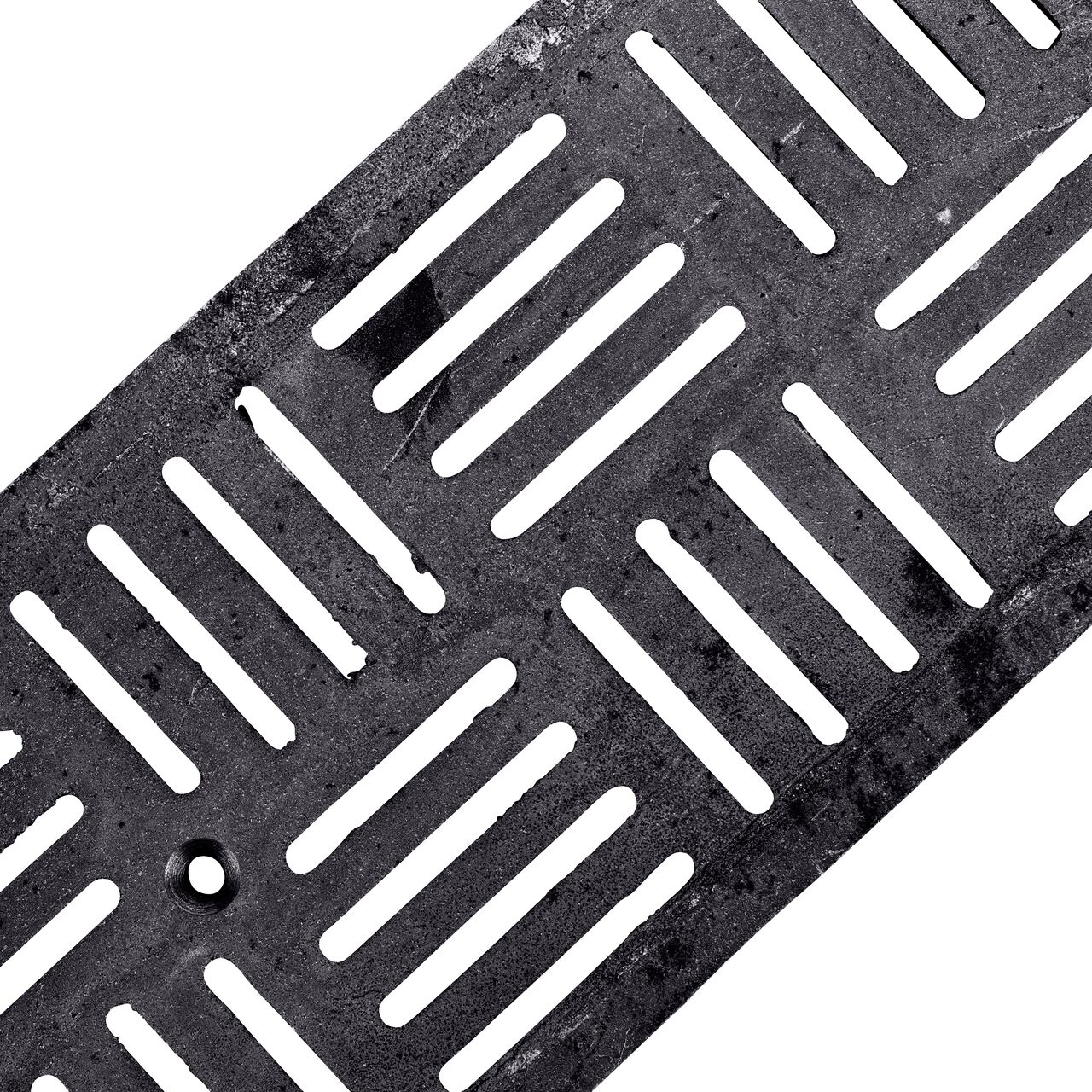Angled View of the ductile iron Dura Slope™ Channel Drain Grate (NDS DS-609) deco slot design