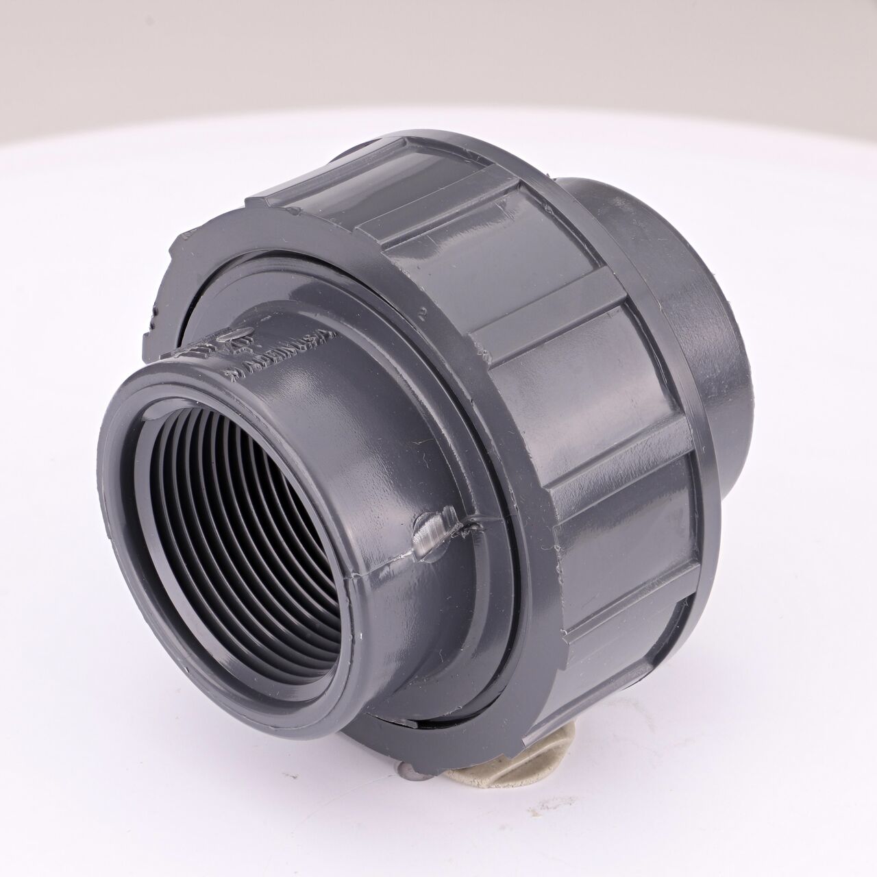 The NDS 1-1/4 in. PVC FPT Union connects two 1-1/4 in. schedule 80 pipes with MPT ends to create a leak-resistant connection without the need for traditional glued sealant (NDS U-1250-T)
