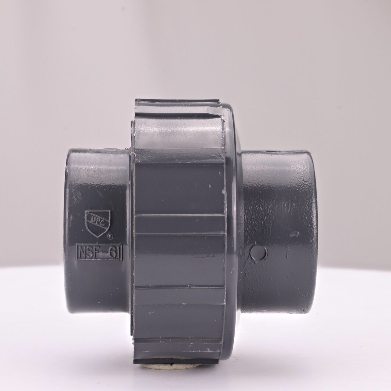 Side view of the NDS 1 in. PVC Union (NDS U2-1000-S) shows both slip ends and a pull-apart feature to quickly disconnect from pipes