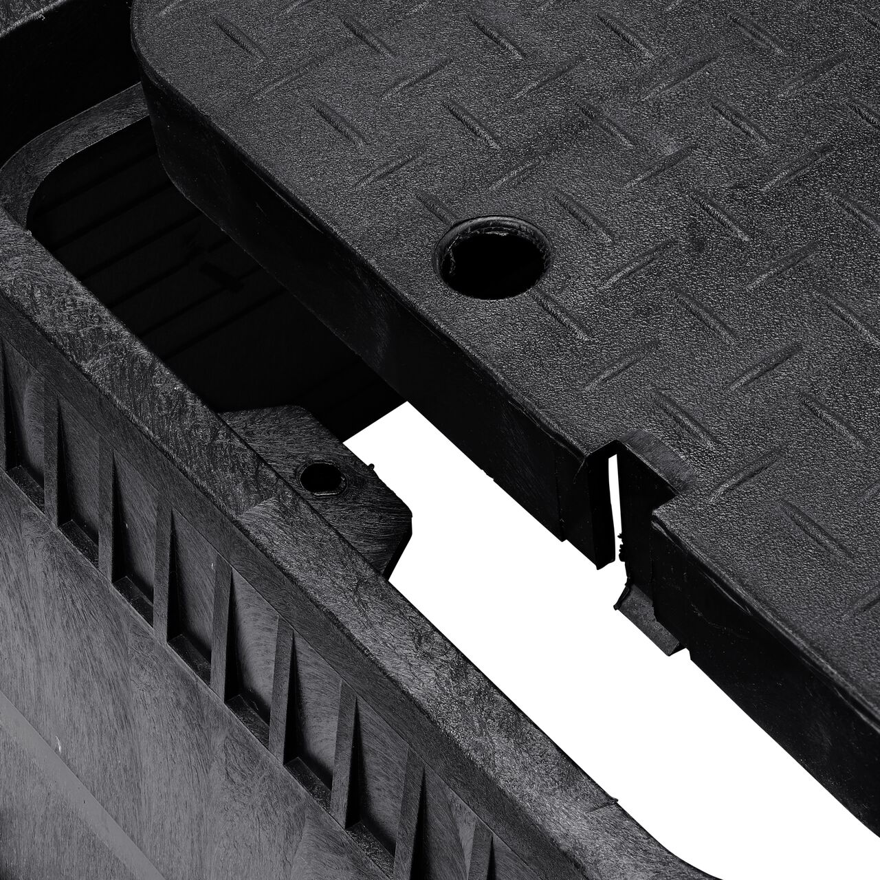 Align the bolt hole on the drop-in AMR cover with the bolt hole from the NDS 13 in. X 20 in. Rectangular Standard Series Black Box and Black Water Meter Cover (NDS D1500-DISBTR) for a secure fit
