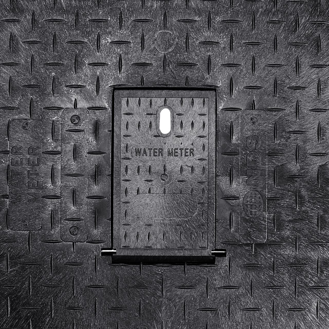 Closeup view of the latching system on the Black NDS 17 in. X 30 in. Rectangular Standard Series Meter Box (NDS 126BCDMB) for securing meter lid or cover to the meter box