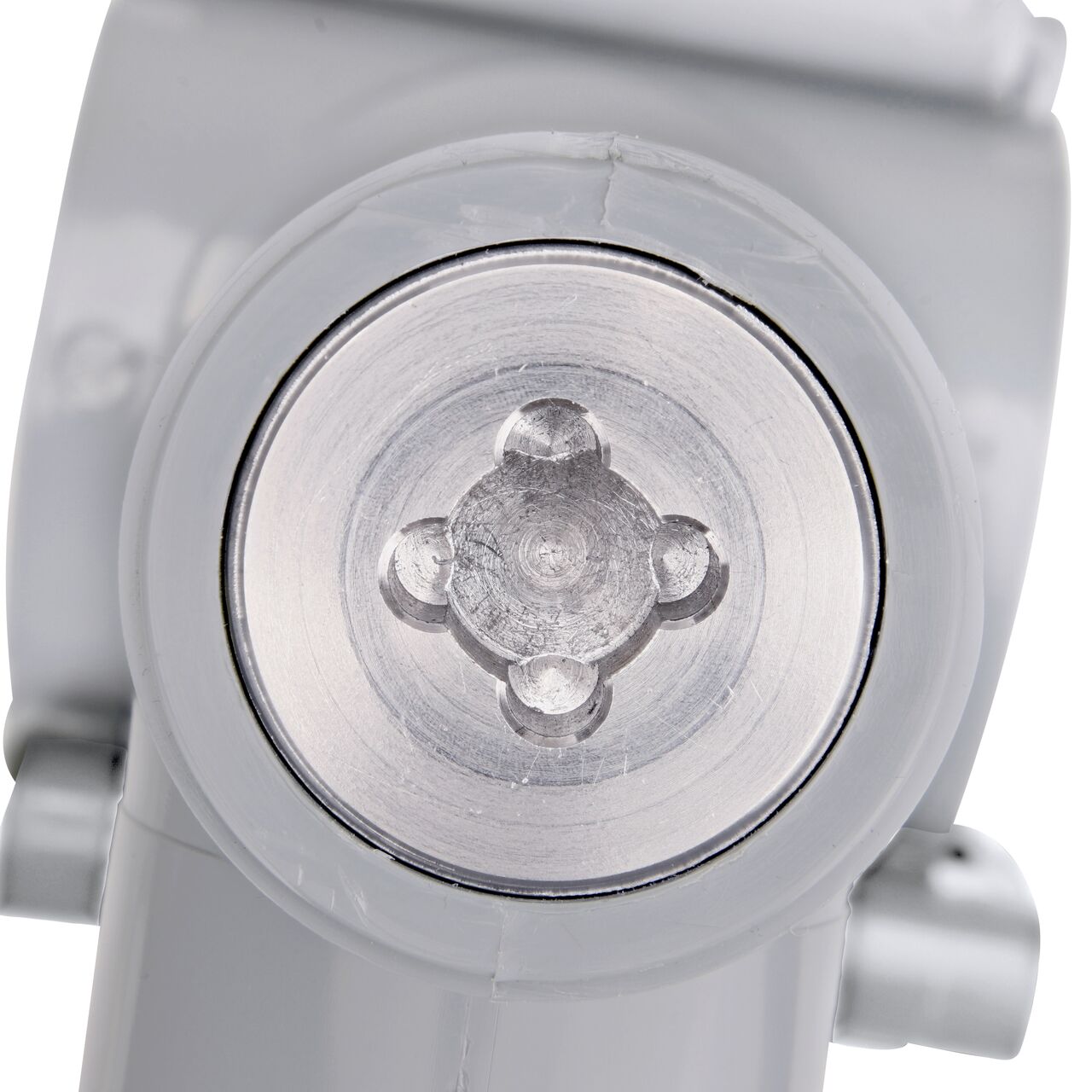Closeup view of the built-in saw tooth cutter in the top connection of the 2-1/2 in. NDS Flo-Tap™ Rigid PVC saddle with 1-1/2 in. socket or 2 in. spigot which cuts easily through PVC pipe wall and captures debris before it can enter the water supply (NDS 3225)