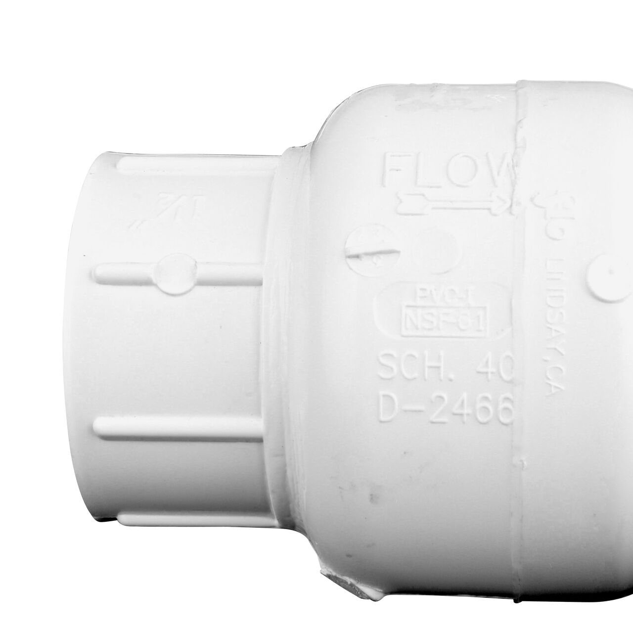 Closeup of the arrow showing water flow direction on the NDS White 1-1/2 in. female end by female end PVC Swing Check Valve (NDS 1520-15F)