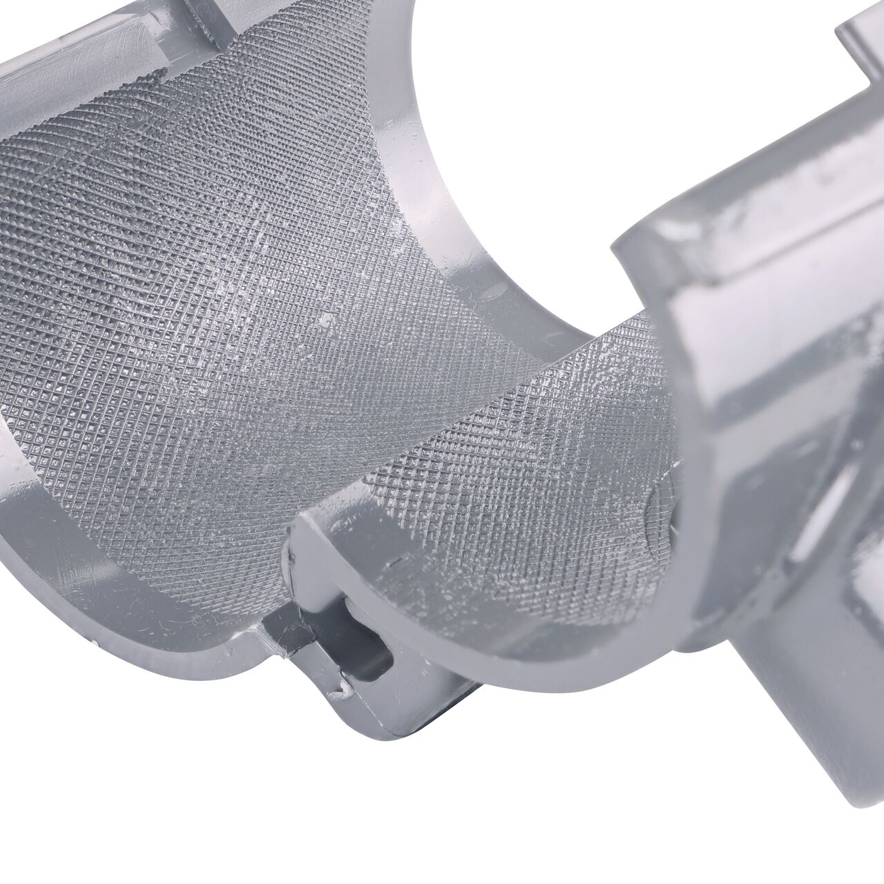 Closeup of the hinge open on the NDS Clamp-It™ Rigid PVC Saddle with 1-1/2 in. slip connection on top (NDS 432515) for 2-1/2 in. PVC pipe