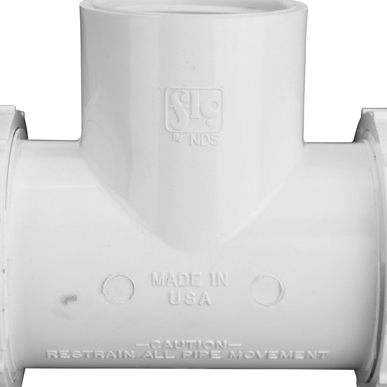 Closeup view of The NDS PVC Threaded Tees 1-1/4 in. IPS UC X FPT showing that it is made in the USA as part of a complete flow management system for pool, spa, irrigation, and plumbing applications (NDS CPT-1250-T)