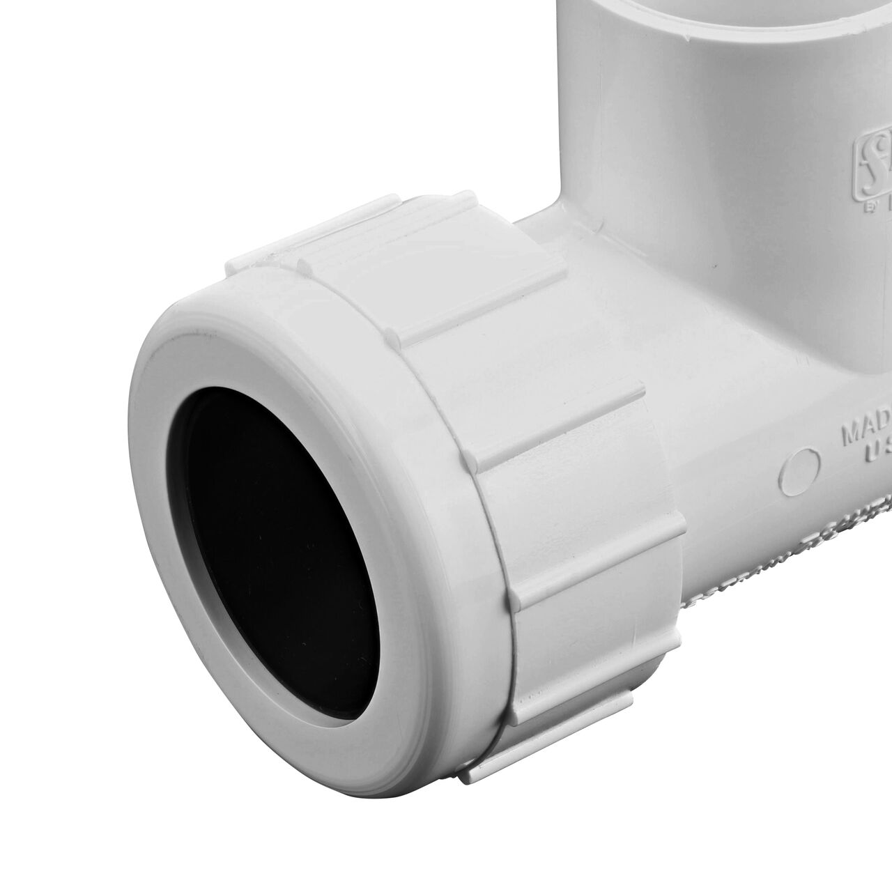 Closeup view of the NDS PVC Threaded Tees showing the compression end with 1-1/4 in. adjustable nuts that secured in place which reduces pull-out from pipe (NDS CPT-1250-S)