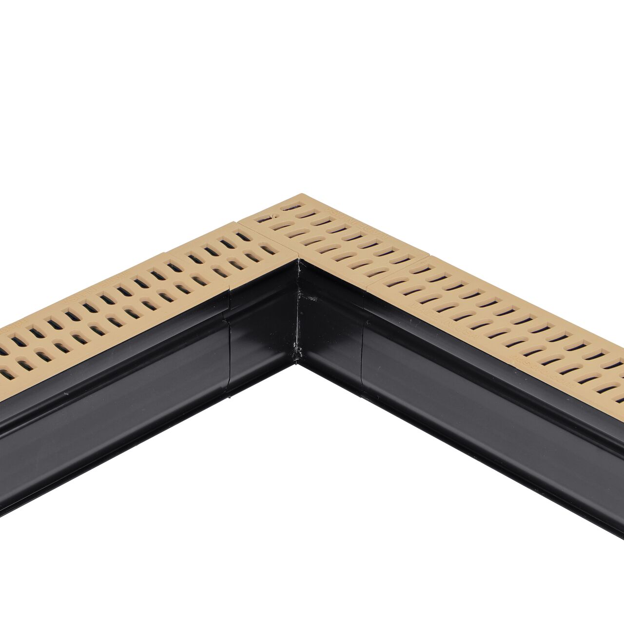 Installation shot with two channel drains and grates to the NDS Sand Slim Channel™ Drain 90° Elbow and Grate (NDS 9382)