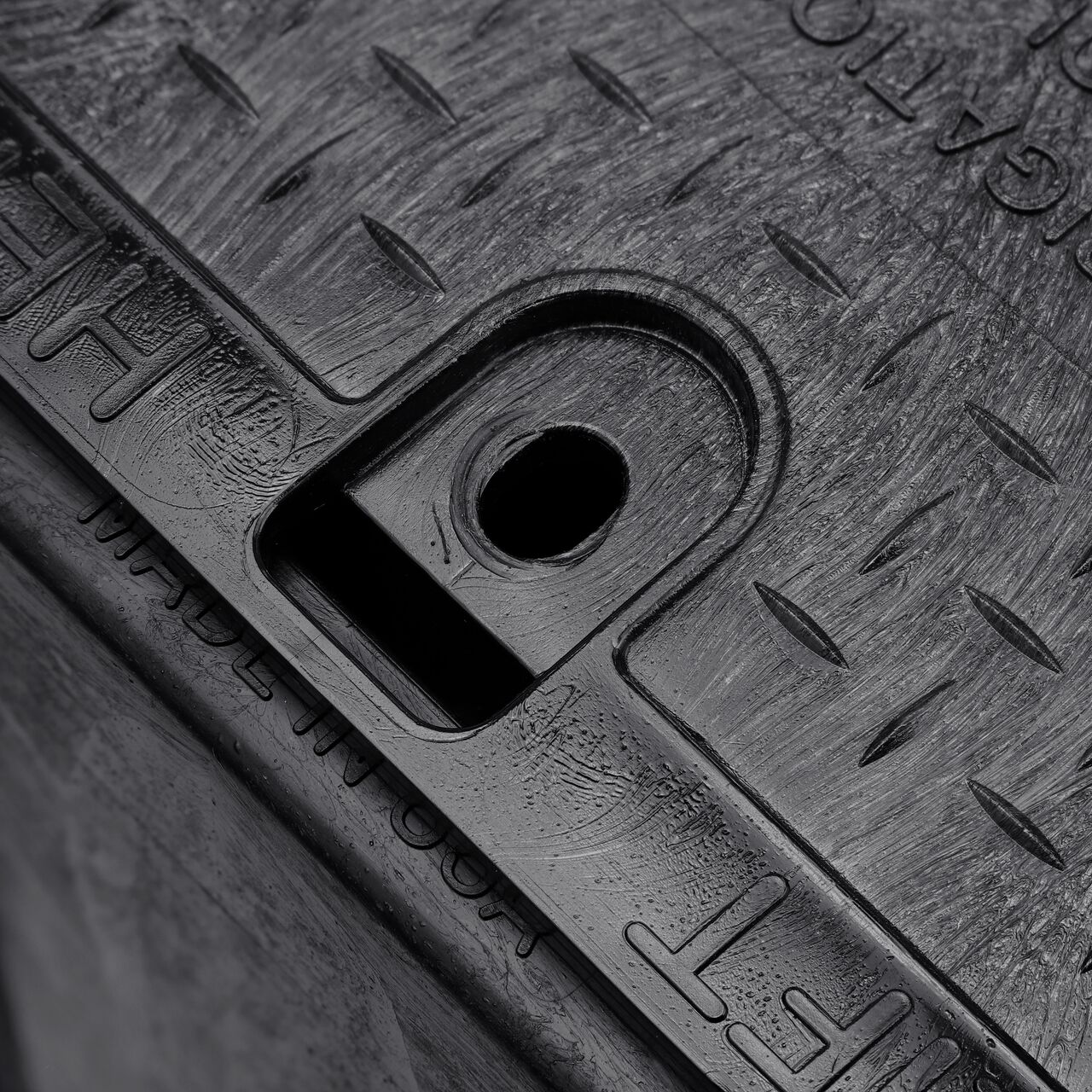 Closeup view of the Black box and Black cover fully assembled, showing locking tabs, bolt hole connection point and reinforced edges on the side of the NDS name of product (NDS 313BCBBLK)