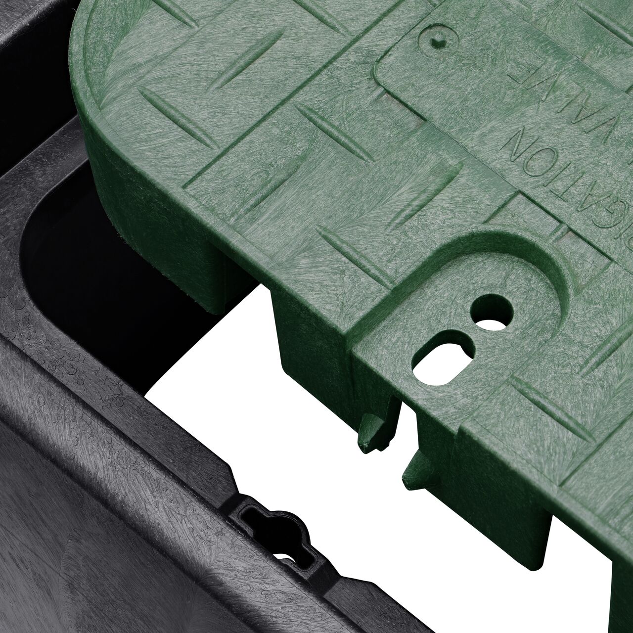 Align the bolt hole on the lid with the universal locking mechanism hole from the NDS 14 in. X 19 in. Rectangular Standard Series Black Box and Green Irrigation Control Valve Cover (NDS 113BCD) for a secure fit