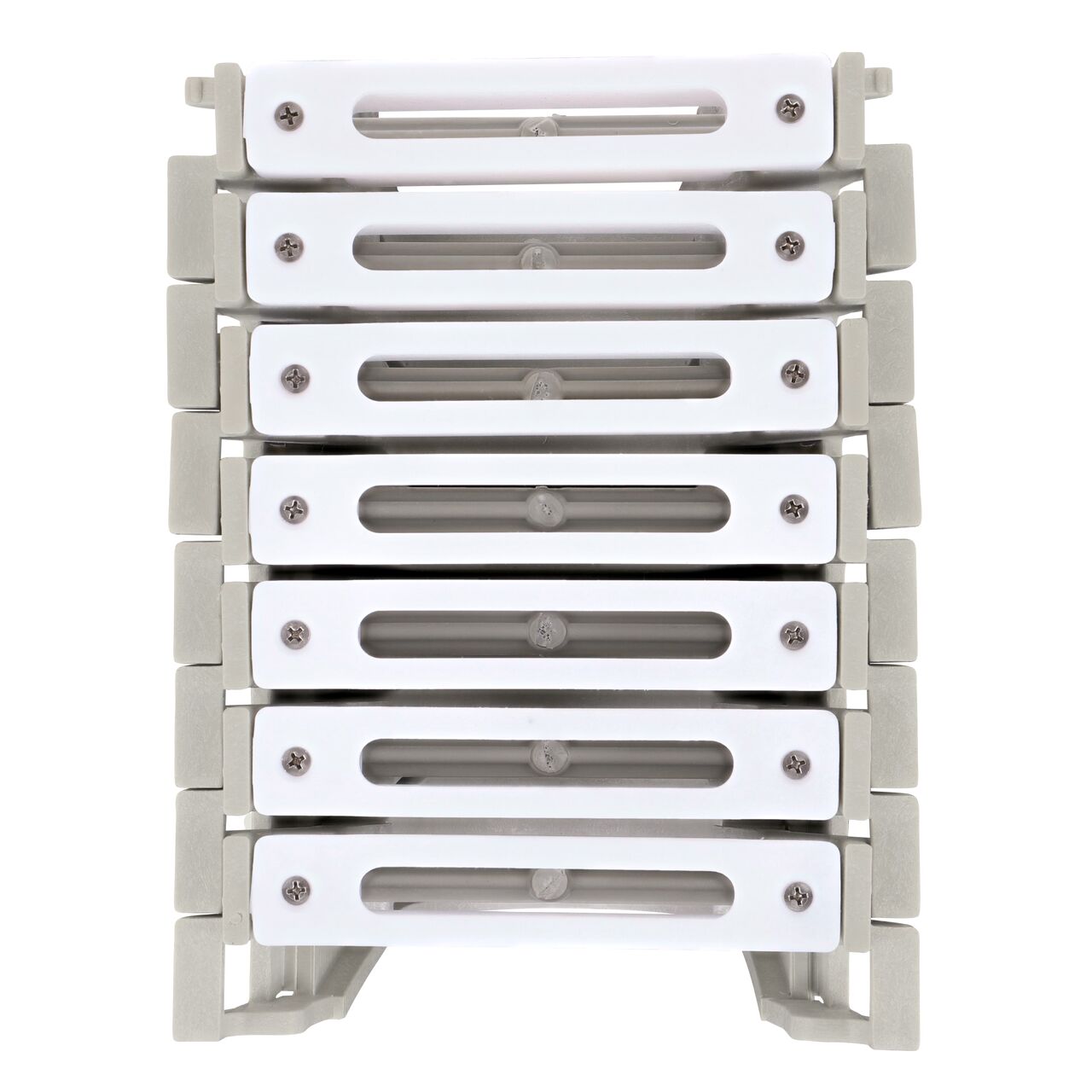 Top down view of Seven White Slotted Plastic Dura Slope™ Channel Drain EZ-Track™ Radius Coupling Grates (NDS DS-660MG) installed on seven Dura Slope EZ-Track Radius Couplings (NDS DSRC) without any turn