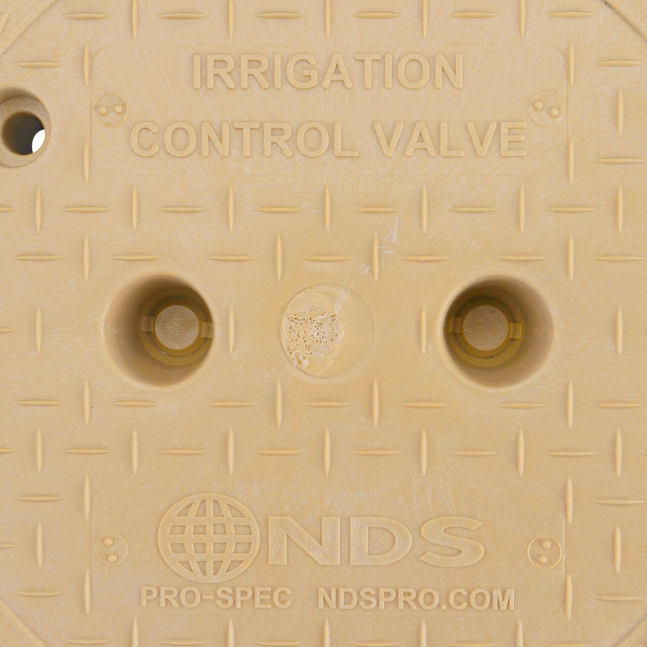 Closeup view of the Water markings on the Sand Irrigation Control Valve cover for the NDS 10 in. Round Pro-Spec® Series Valve Box (NDS 312BCBSAND)