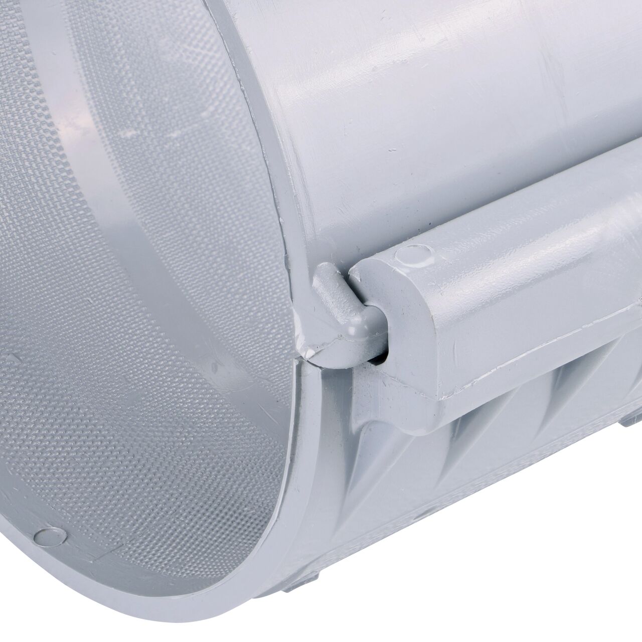 Closeup of the hinge closed on the NDS Clamp-It™ Rigid PVC Saddle with 1-1/2 in. FPT connection on top (NDS 446015) for 6 in. PVC pipe