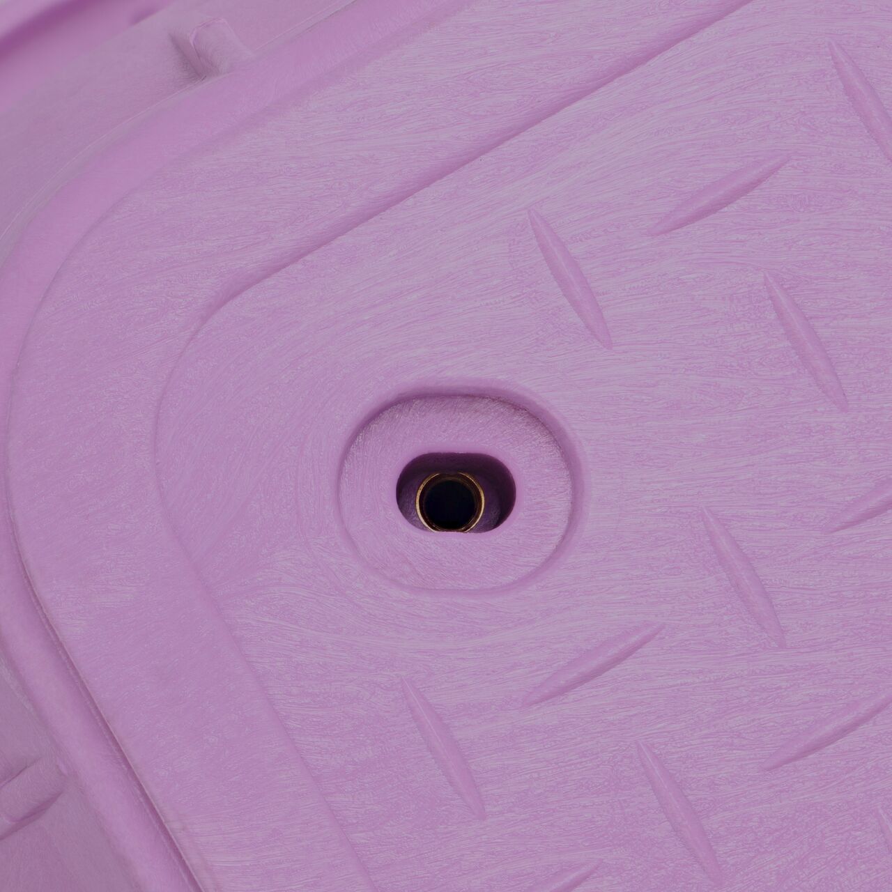 Closeup view of the bolt hole alignment between the cover and box on the NDS 13 in. X 24 in. Rectangular Pro-Spec® Series Purple Box and Purple Reclaimed Water Cover Lid (NDS 322PBCBR)
