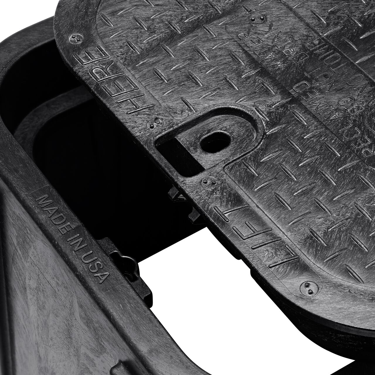 Align the bolt hole on the lid with the universal locking mechanism on the box from the NDS 14 X 19 in. Rectangular Pro-Spec® Series Black Box and Black Reclaimed Water Cover (NDS 313BCBRBLK) for a secure fit