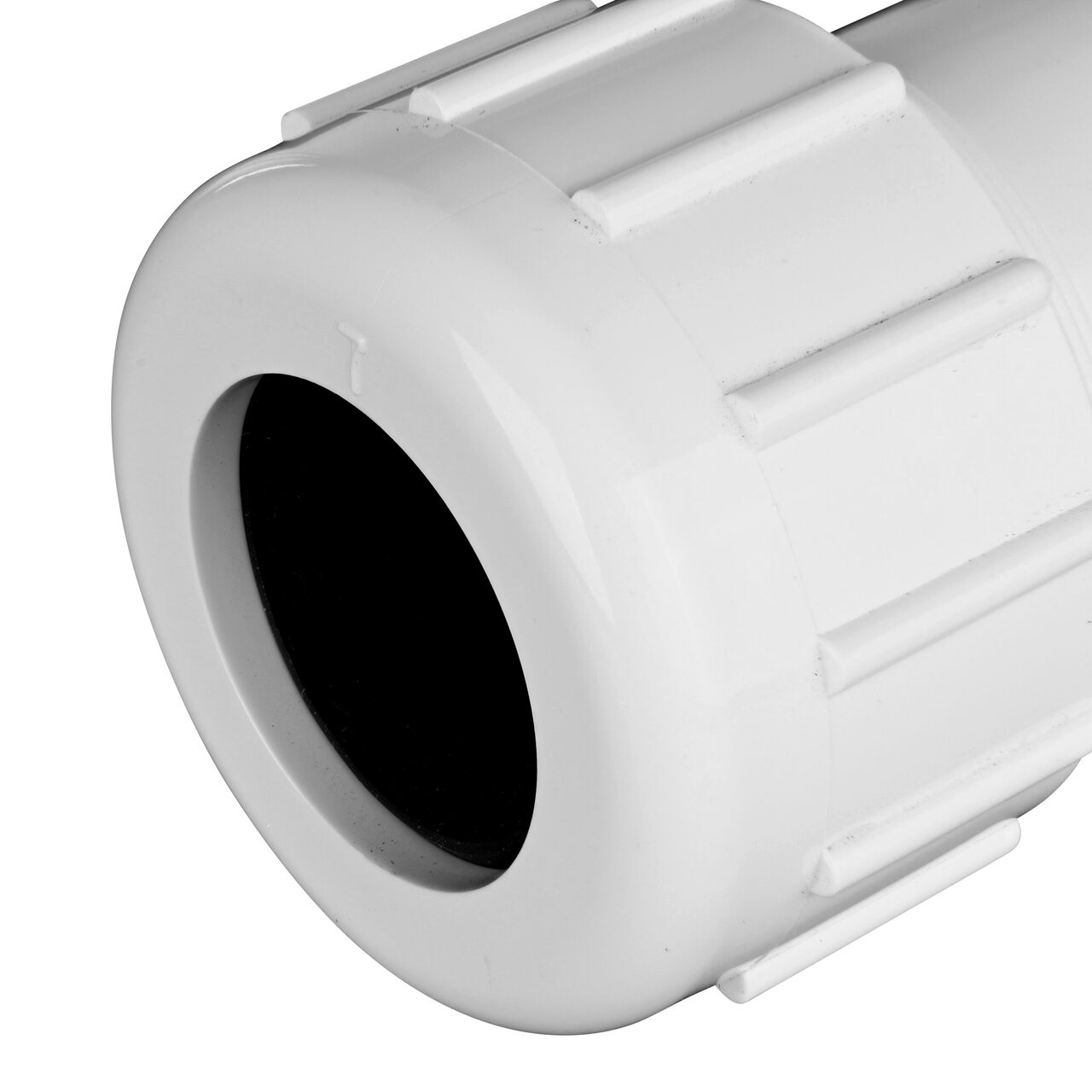 Closeup view of the NDS IPS UC Compression Coupling showing the 3/4 in. compression end with adjustable nut secured which reduces pull-out from pipe (NDS CPC-0750)
