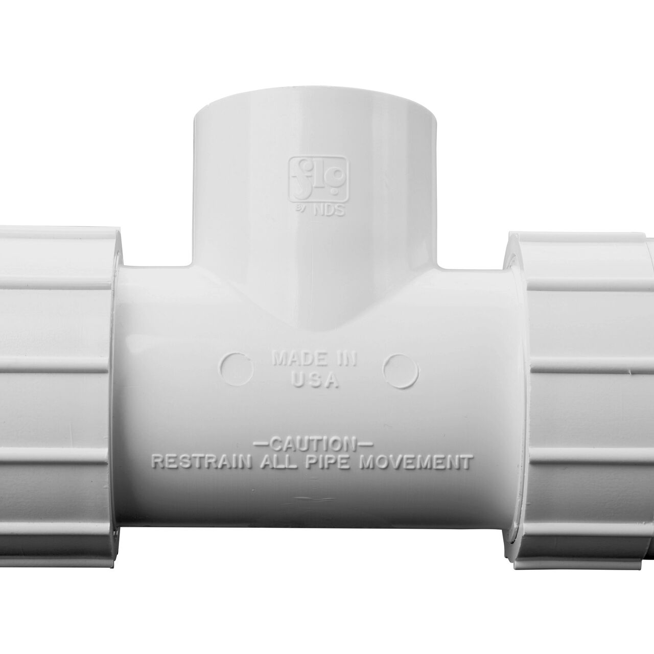 Closeup view of The NDS PVC Threaded Tees 1-1/4 in. UC X S IPS showing that it is made in the USA as part of a complete flow management system for pool, spa, irrigation, and plumbing applications (NDS CPT-1250-S)