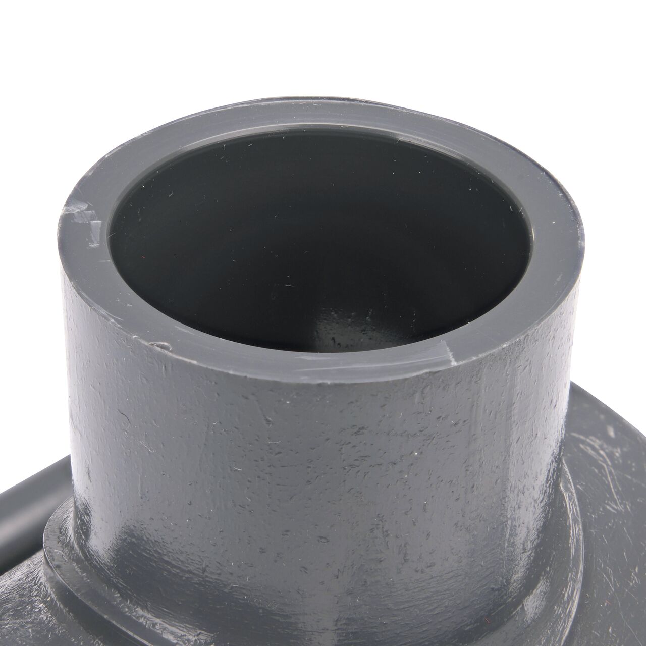 Closeup of the 1 in. slip connection on top of the NDS Clamp-It™ Rigid PVC Saddle for 2 in. PE pipe (NDS 332010P)