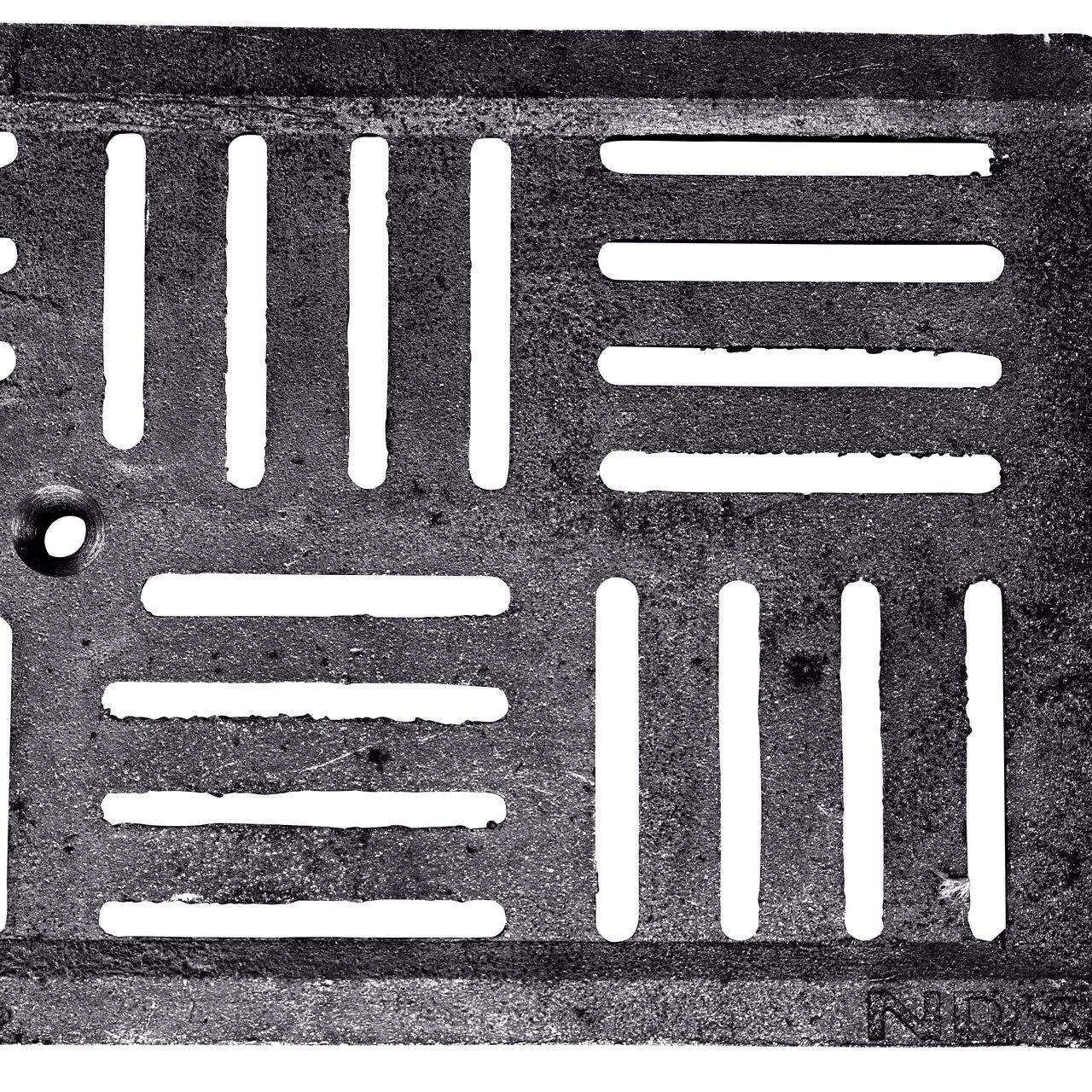 Top Down View of the ductile iron Dura Slope™ Channel Drain Grate (NDS DS-609) deco slot design