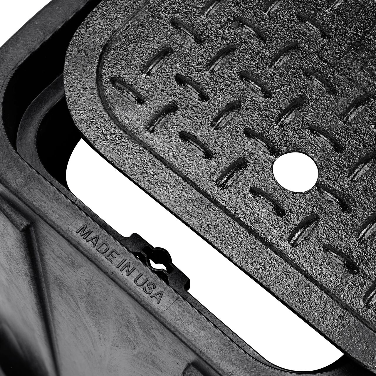 Align the bolt hole on the lid with the universal locking mechanism hole from the NDS 14 in. X 19 in. Rectangular Standard Series Black Meter Box and Black Cast Iron Water Meter Cover (NDS D1200-CI) for a secure fit