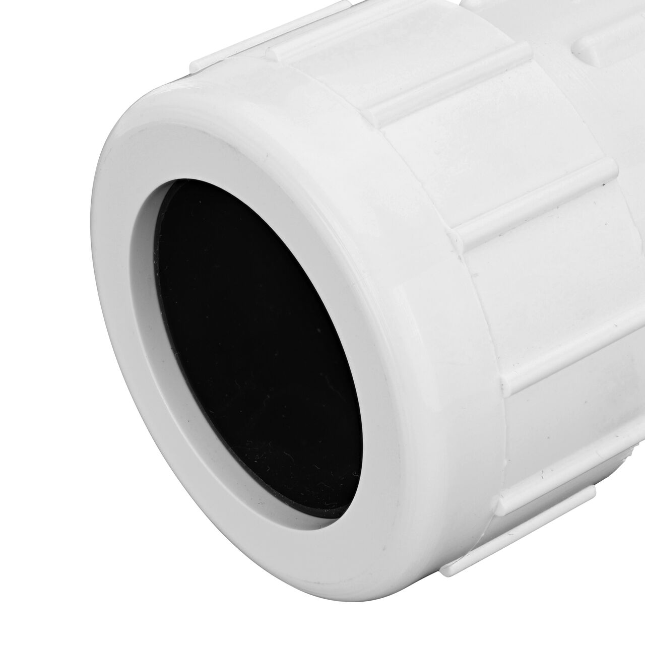 Closeup view of the NDS IPS PVC Male Adapters showing the 1-1/2 in. compression end with adjustable nut secured which reduces pull-out from pipe (NDS CPA-1500)