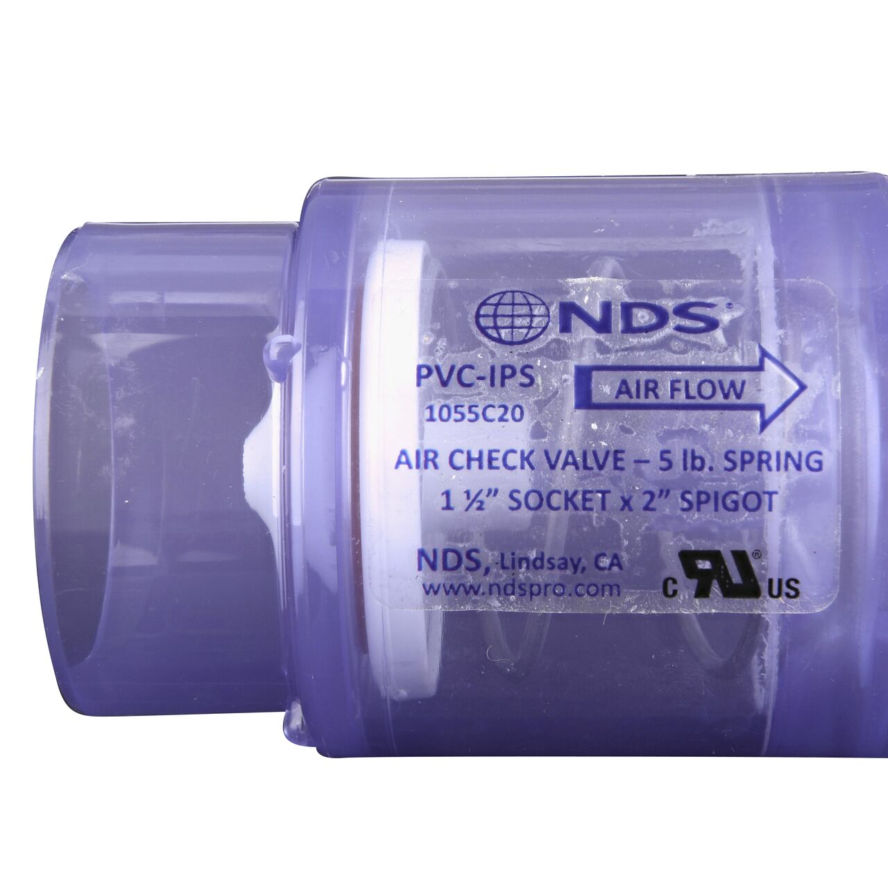 Closeup of the arrow showing water flow of the NDS Clear 1-1/2 in. slip end by 2 in. spigot end PVC Air Check Valve with 5 lb. Spring (NDS 1055C20)