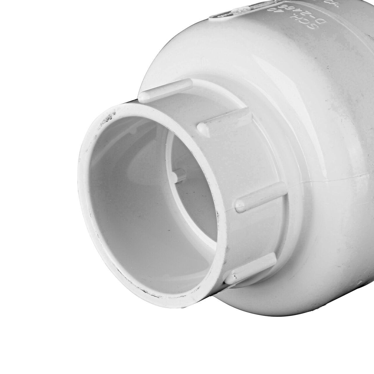Closeup of the inlet end on the NDS White 2 in. slip end by slip end PVC Swing Check Valve (NDS 1520-20) which prevents backflow in pipelines