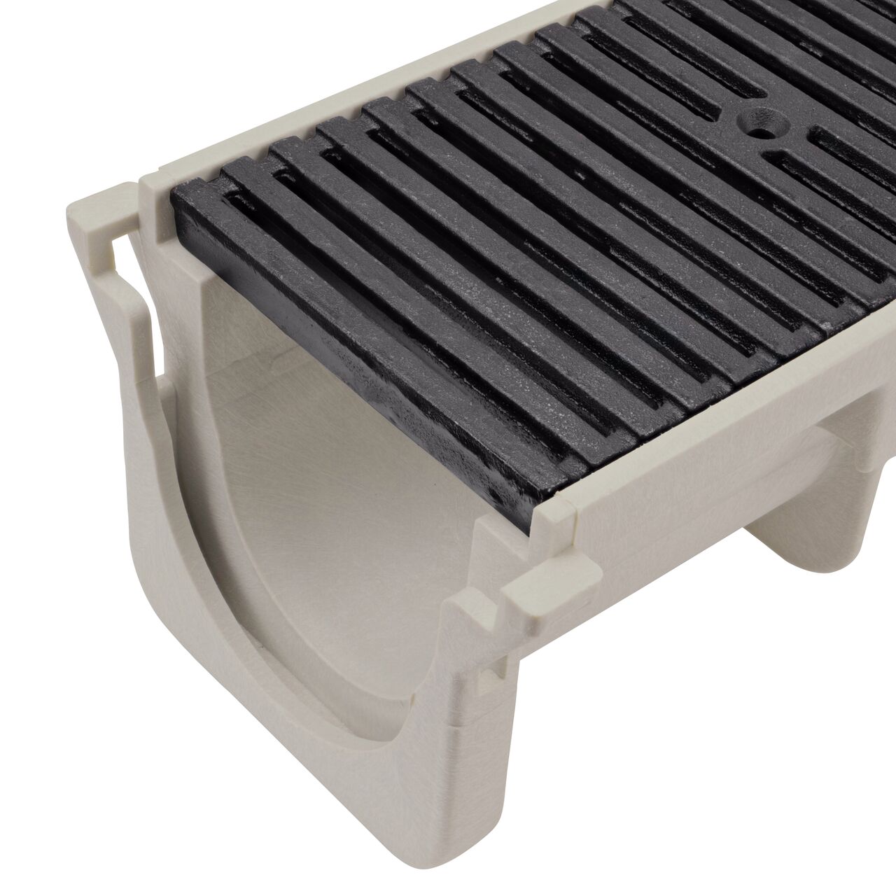 Closeup View of the ductile iron decorative Kiaro Slot design Dura Slope™ Channel Drain Grate (NDS DS-610-KIARO) installed on the Dura Slope Channel Drain (NDS DS-091)