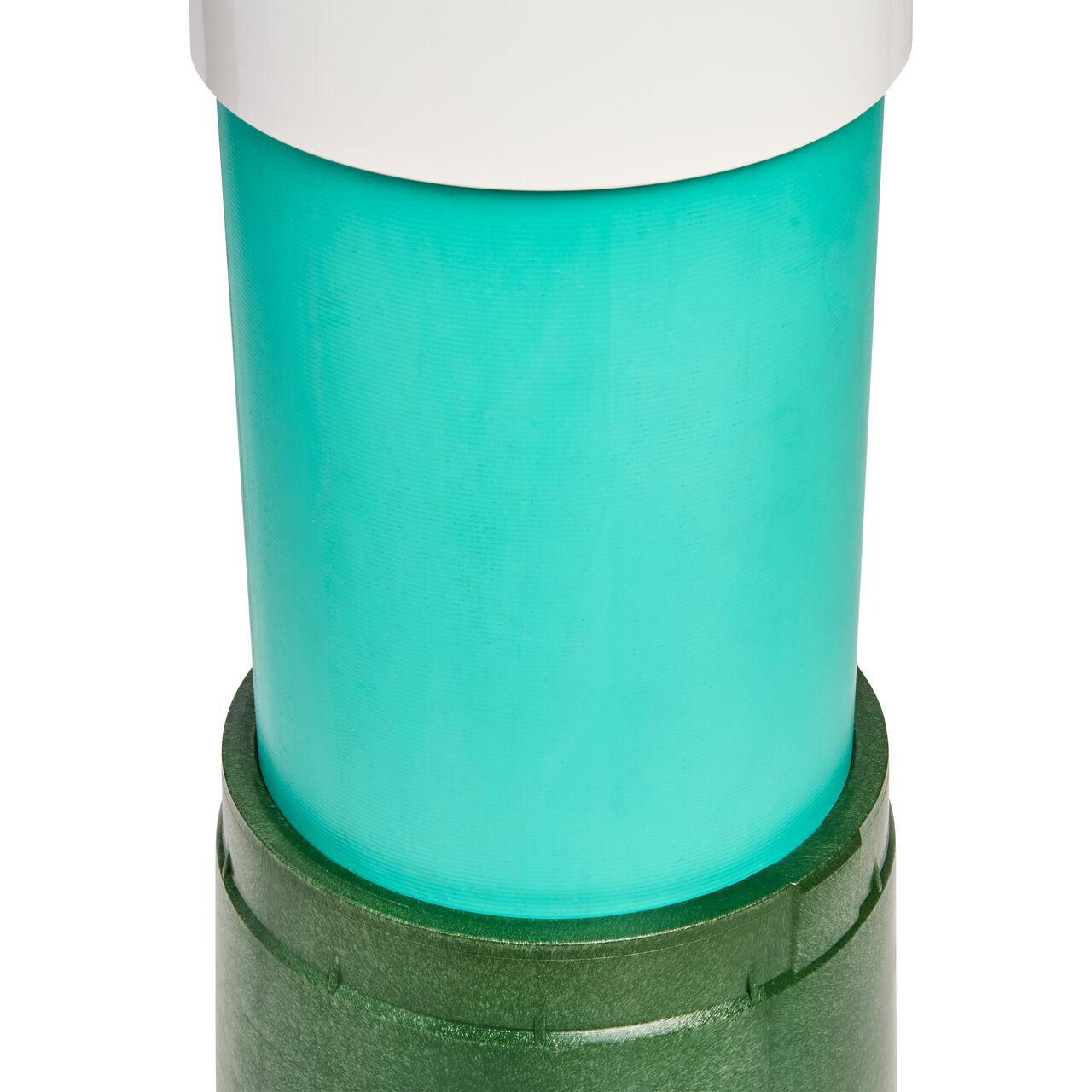 Closeup of the a 6 inch bell end SDR-35 sewer & drain pipe inserted in the top of the Green plastic 6 in. Round Standard Series Valve Box (NDS 2108B) with a 6 inch NDS coupler (NDS 6P05) on top to extends the basin intake to the surface level