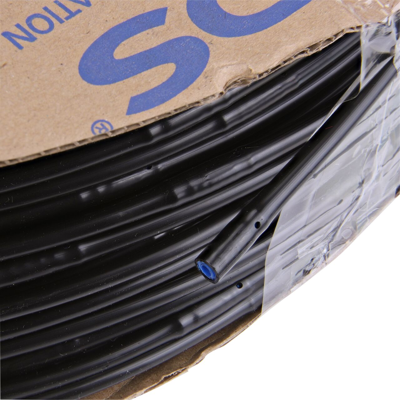Closeup of the ned to show how to pull out the dripline of the NDS 1,000 ft. 1/4 in. Dura Flo™ JR Dripline with 6 in. spaced 0.5 GPH Non-Pressure Compensating Emitters (NDS SFJR-BL-06-10)