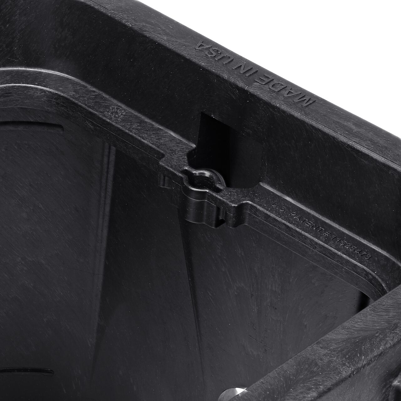 Closeup view of the universal locking mechanism hole on the Black NDS 14 X 19 in. Rectangular Pro-Spec® Series Valve Box (NDS 313BCBBLK) for securing valve lid or cover to the valve box