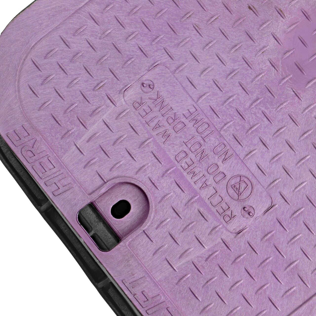 The valve box lid securely in place on the NDS 14 X 19 in. Rectangular Standard Series Black Box Extension and Purple Reclaimed Water Cover (NDS 115BCR) keeping components protected against the elements, foot traffic, lawn care equipment, and potential vandalism while keeping them out of sight
