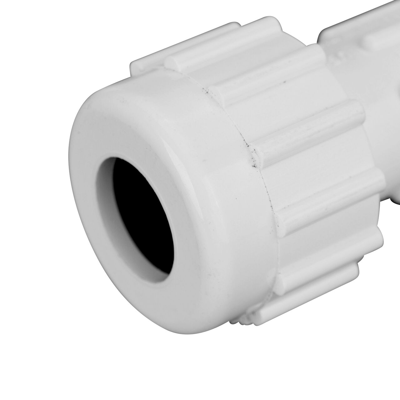 Closeup view of the NDS CTS UC Compression Coupling showing the 1/2 in. compression end with adjustable nut secured which reduces pull-out from pipe (NDS CCC-0500)