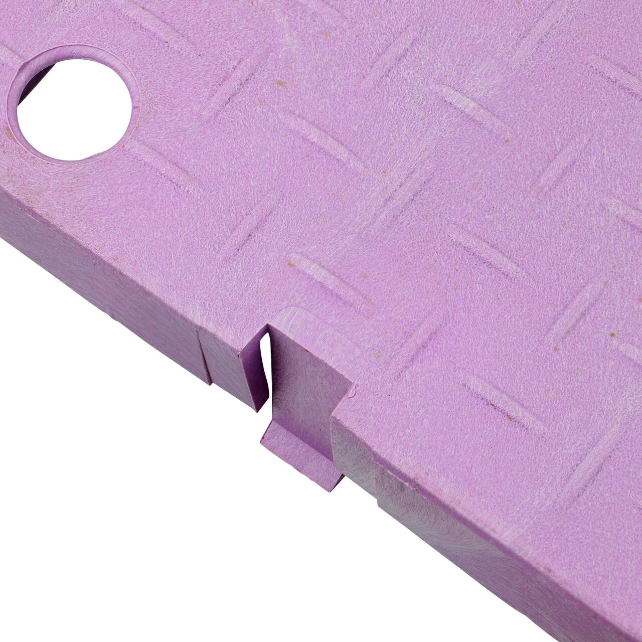 Closeup view of the edge and finger hole on the purple NDS 13 x 20 in. Standard Series Water Meter cover (NDS D1500-DISBL) for the NDS 13 in. X 20 in. Rectangular Standard Series Meter Box