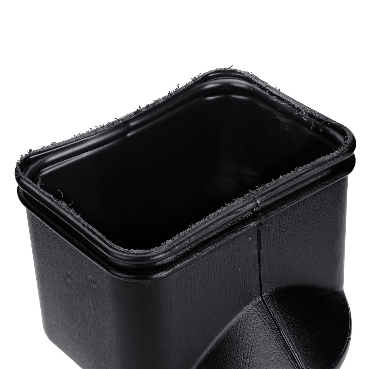 Closeup of the ridges outside of the rectangular opening of the High-Density Polyethylene Downspout Adapter transitions 3X4 in. Downspout to 4 in. Hub (NDS 344CDS)