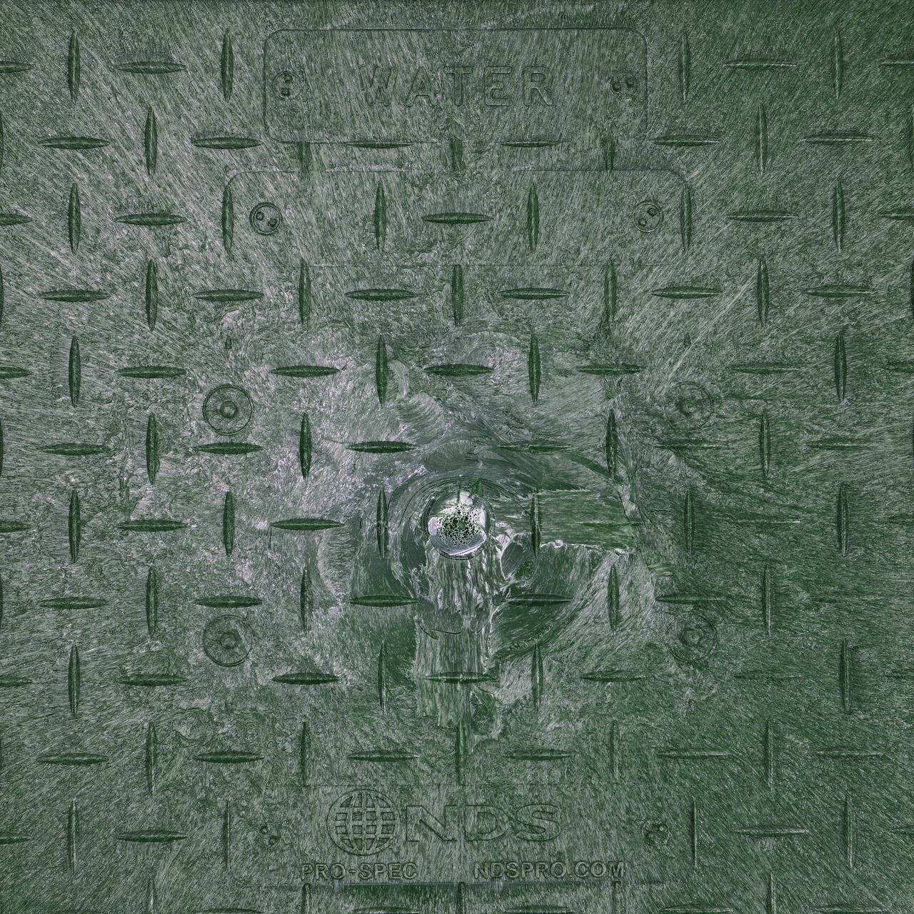 Closeup view of the Water markings on the Green Water cover for the NDS 13 in. X 24 in. Rectangular Pro-Spec® Series Valve Box (NDS 321BCBW)